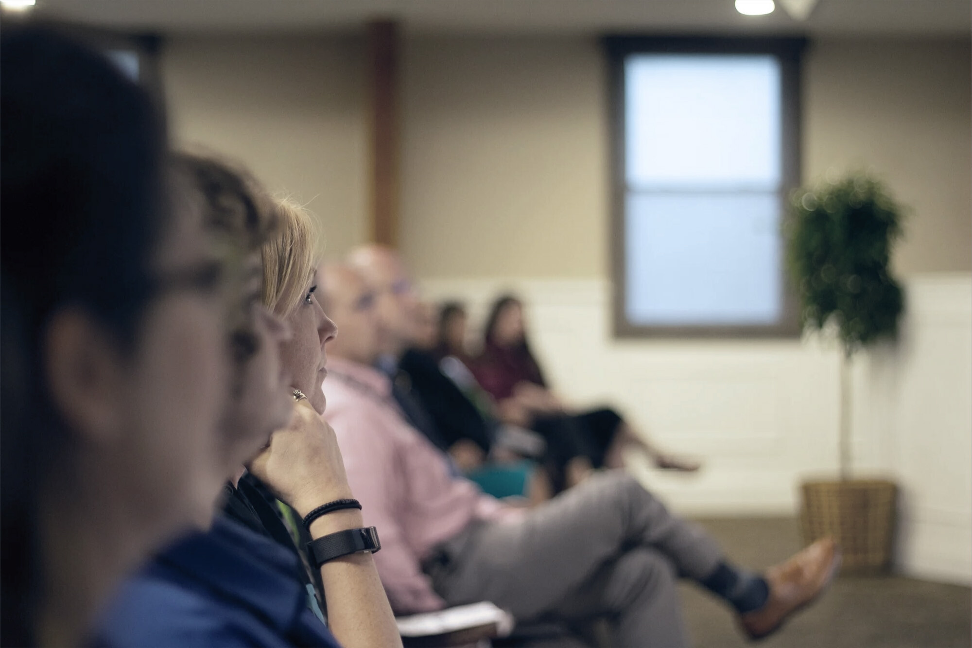 seminar-attendees-listening-enjoying-presentation