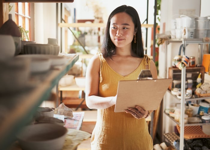 kitchen-stock-checking-asian-woman-and-clipboard-2023-11-27-05-06-19-utc-1